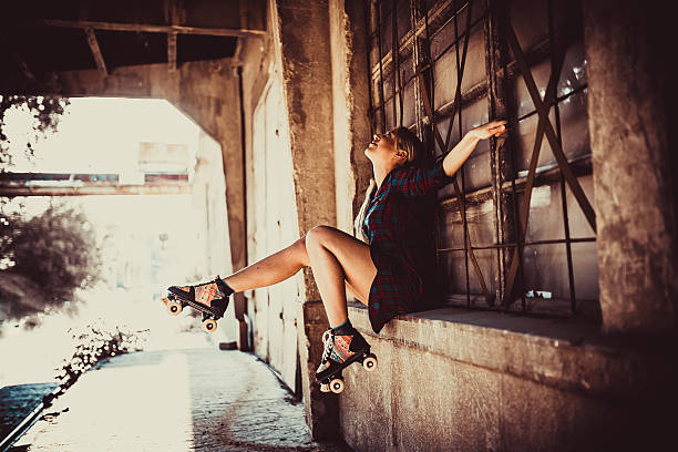 istock Happy rollerskater woman 586199720