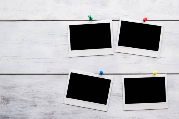 istock Blank Photo Frame on White Wood 586202868