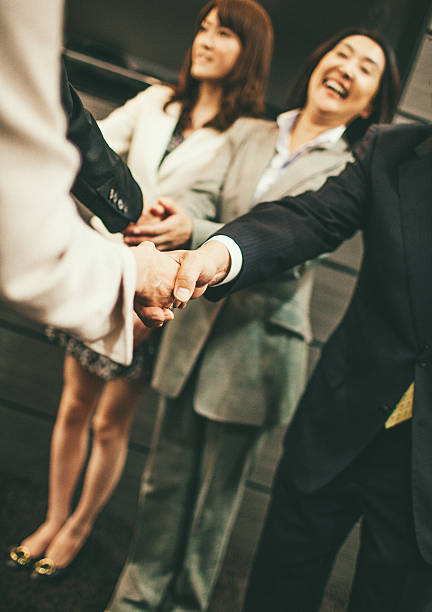 istock Japanese business deal 586203820