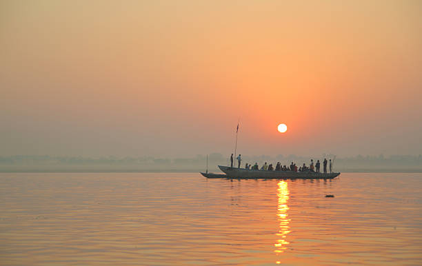 istock Boat at sunrise on ganges river 586207726