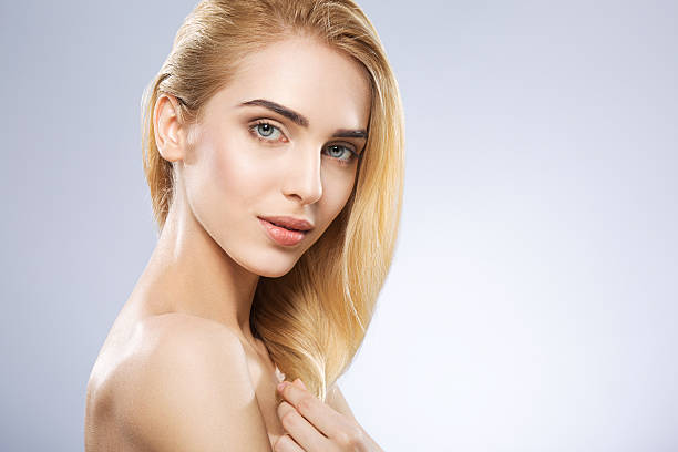 istock Beautiful girl with nude make up at studio 586208364