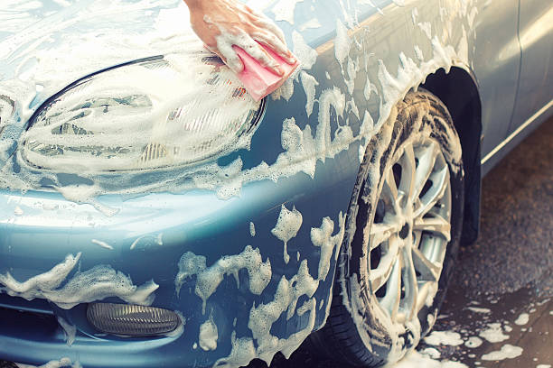 istock cleaning car with a sponge and foam 586208830