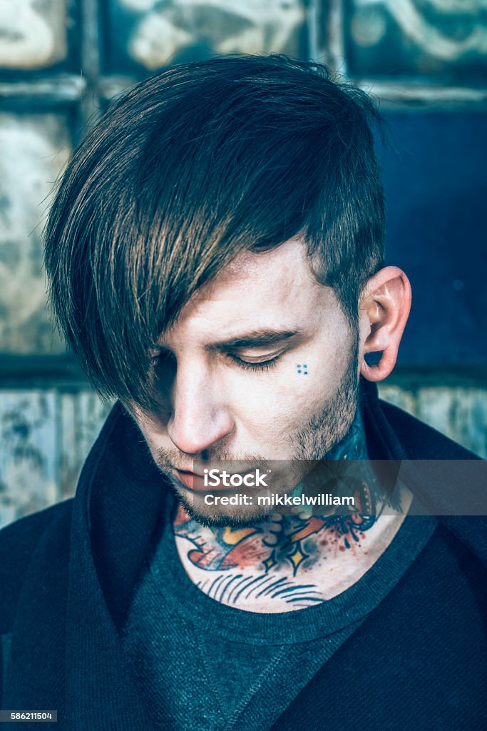 Young Adult With Funky Haircut And Tattoos On Neck Stock Photo - Download  Image Now - 20-29 Years, Adult, Adults Only - iStock
