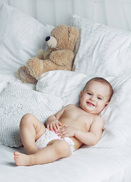 istock baby at home in bed 586346350