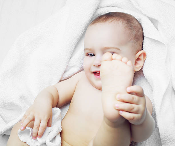 istock baby with a towel 586347150