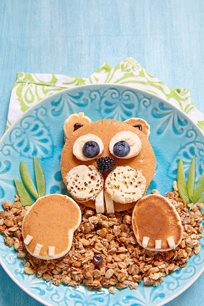 istock Funny breakfast - beaver pancake with muesli 586348744