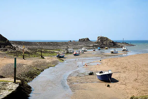 The attractive harbor breakwater and sandy beach at Bude north Cornwall England