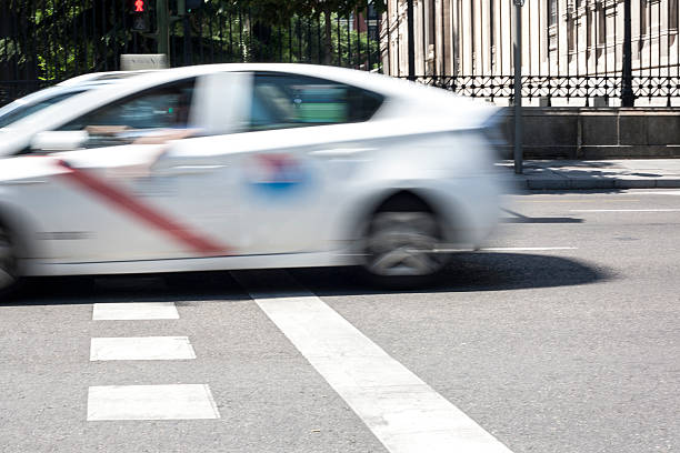istock Taxicab crossing Madrid downtown 586351622