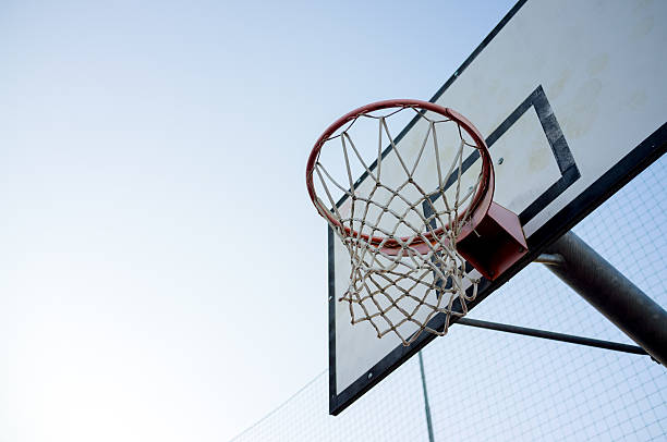istock Basketball basket hoop from below 586351884