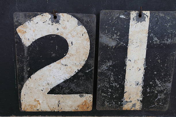 The number twenty-one on an old scoreboard stock photo