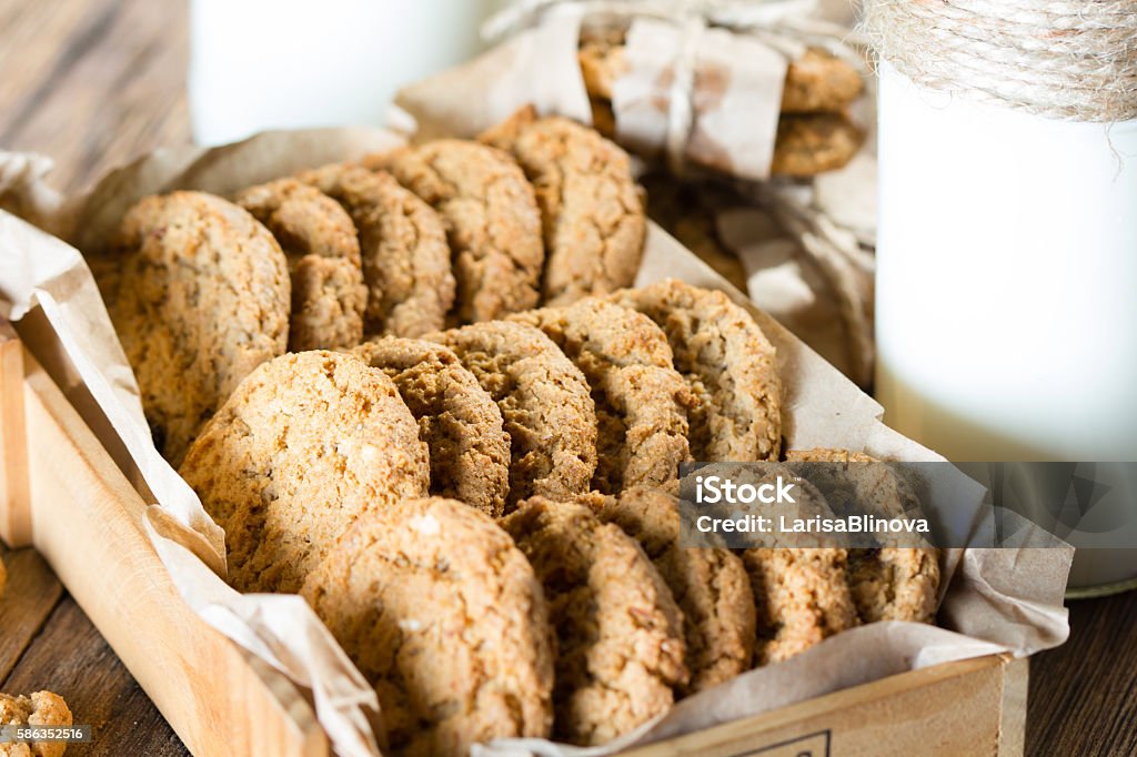 Close up of oatmeal cookies in wooden box. Rustic style Close up of oatmeal cookies in wooden box. Rustic style. Toning Oatmeal Cookie Stock Photo