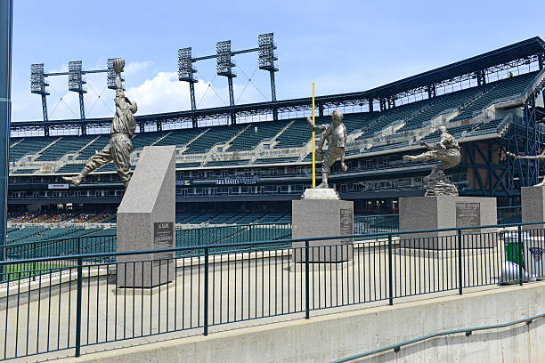 Comerica Park baseball park in Detroit Michigan Detroit, Michigan, USA - May 26, Marked by its signature tiger statues, Comerica Park is a baseball park which was part of the revitalization of Detroit and replaced Tiger Stadium in 2000. detroit tigers stock pictures, royalty-free photos & images