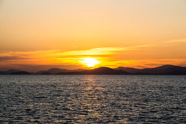 istock Beautiful golden sunset over the sea 586353970
