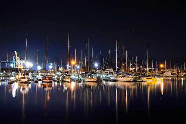 istock Boats docked at Harbour by Night 586354630