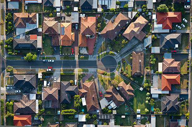 Melbourne suburbs fFying over the suburbs of Melbourne Australia melbourne australia stock pictures, royalty-free photos & images