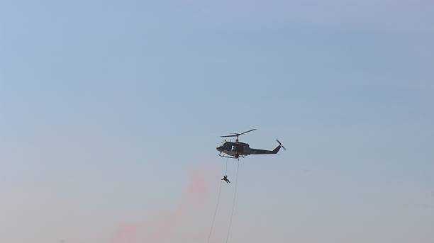istock Fast-lope are  leave helicopter. 586356646