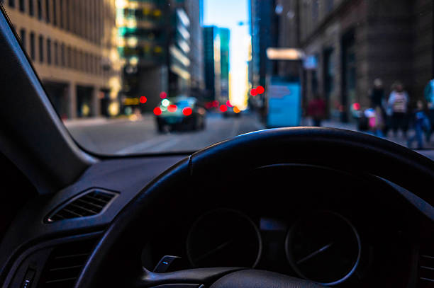 istock Urban Street - View From Inside A Car 586360202