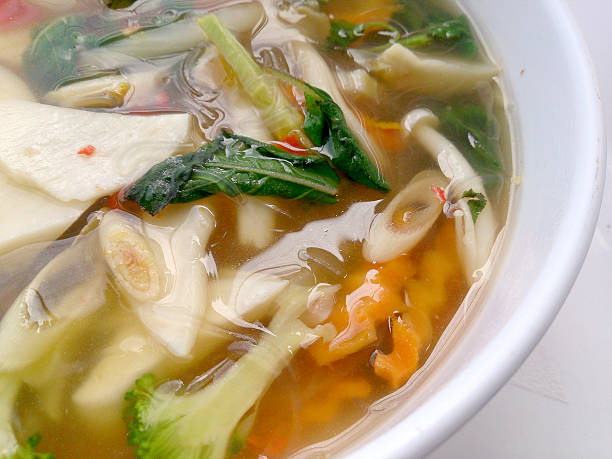 istock Spicy Soup with mushroom,  mix vegetable and Thai herbs 586361414