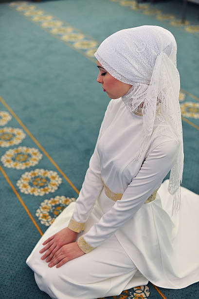 istock Muslim praying in a mosque 586363690