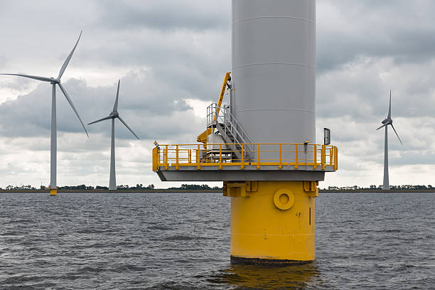 Foundation Dutch wind turbine in the sea Foundation big Dutch wind turbine in the sea flevoland photos stock pictures, royalty-free photos & images