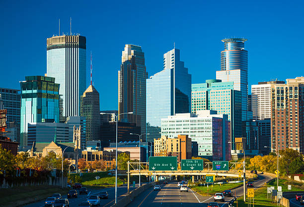 istock Minneapolis Skyline and Highway with Deep Blue Sky 586368908