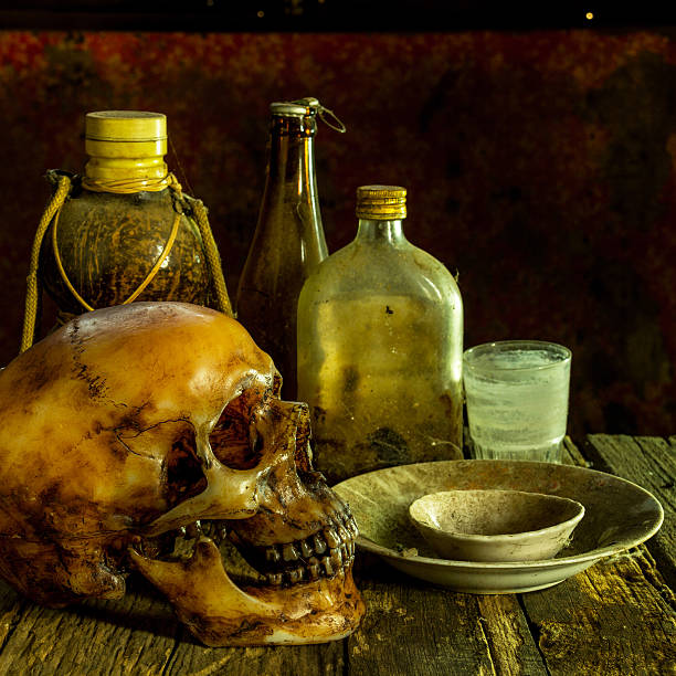 istock Still Life with a Skull on wooden 586369194
