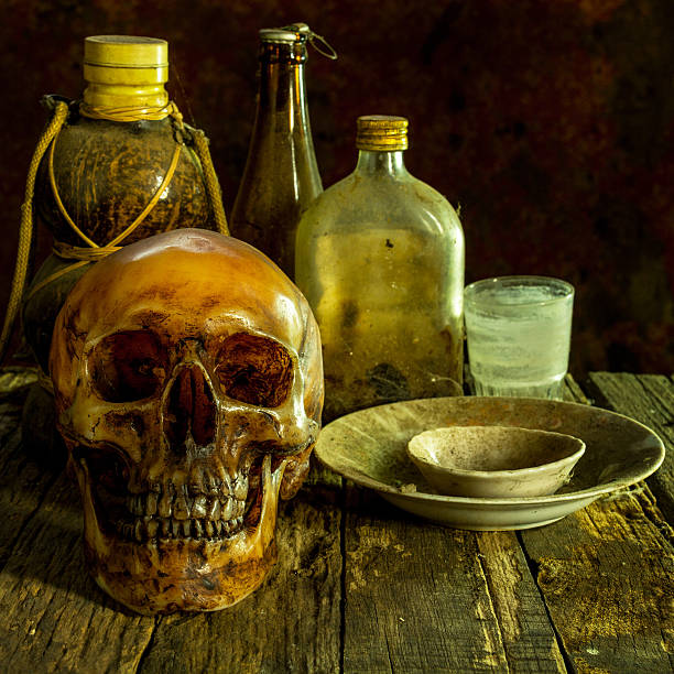 istock Still Life with a Skull on wooden 586369282