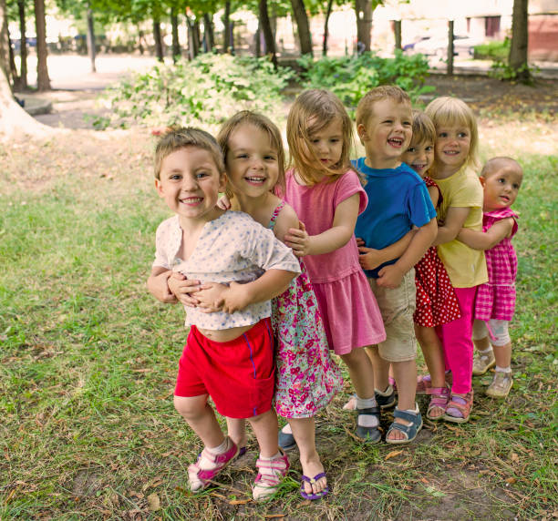 istock Cute Children Playing At Park 586369458