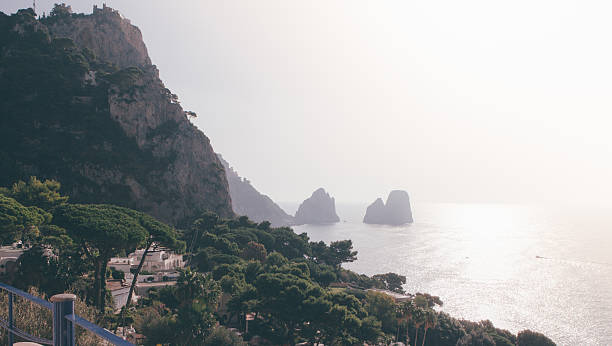 istock 'Faraglioni' rocks , Capri island. 586369682