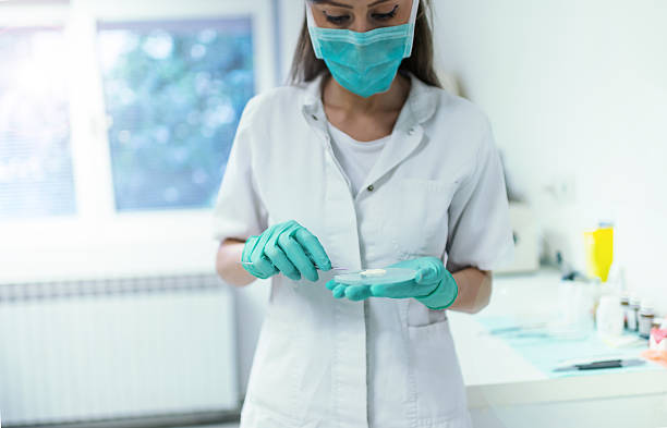 istock Preparing medicine in medical laboratory 586371146