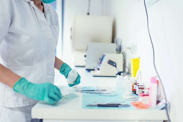 istock Preparing medicine in medical laboratory 586371234