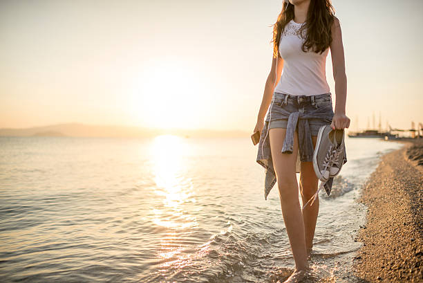 istock Morning walk by the sea . 586371598