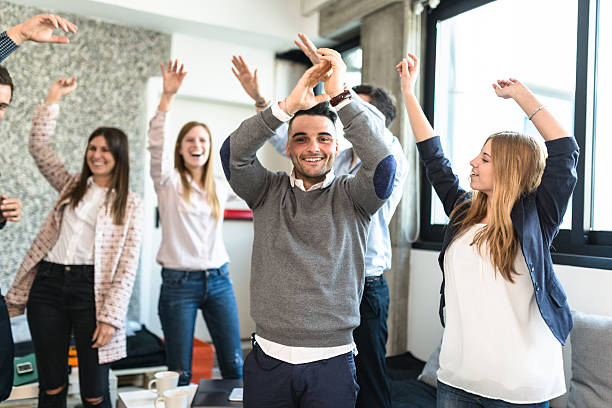 istock friends togetherness have a party in the office 586373330