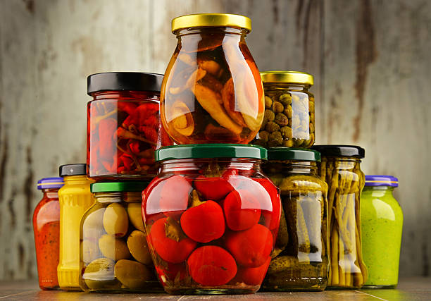 istock Jars with variety of pickled vegetables. 586373430