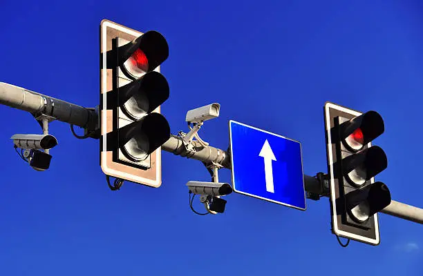 Photo of Traffic lights over blue sky