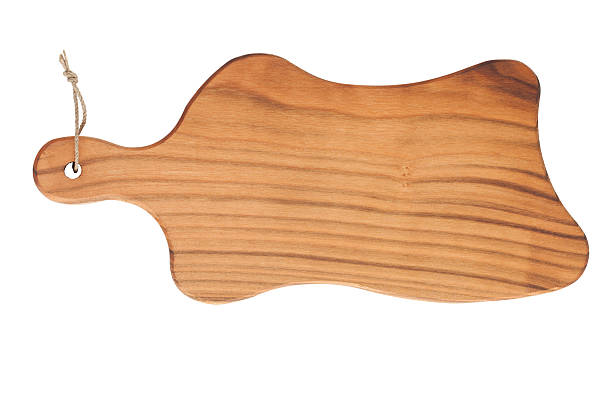 istock Cutting board made of cherry wood isolated on white background 586376384