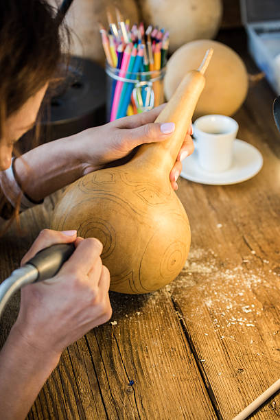 istock carving in calabash or gourd 586376394