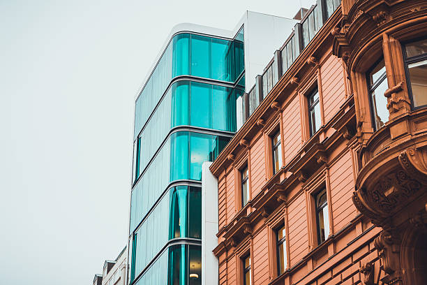 istock Historic stone building with glass elevator shaft 586377076
