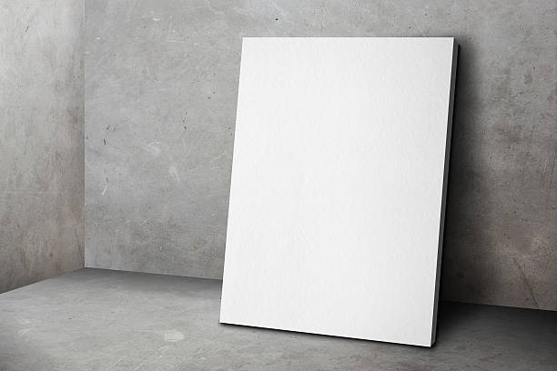 istock Blank white poster frame leaning at grunge grey concrete wall 586378438