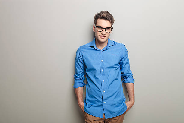 istock Smiling young casual man wearing glasses 586378698