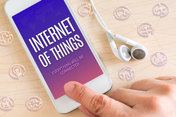 istock Hand touch smart phone bwith Internet of things 586378954