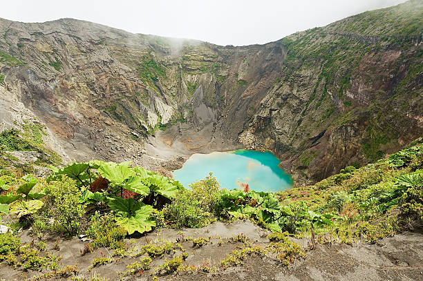 Crater of the Irazu active volcano, Cartago, Costa Rica. View to the crater of the Irazu active volcano situated in the Cordillera Central close to the city of Cartago, Costa Rica. irazu stock pictures, royalty-free photos & images