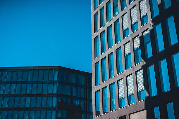 istock Dark and light office building exteriors 586381166