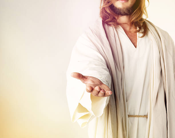 Give me your fear and I’ll give you my hand Cropped studio shot of Jesus Christ extending his arm in assistance christ the redeemer stock pictures, royalty-free photos & images