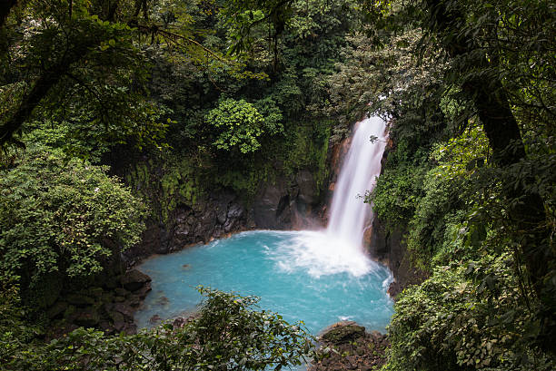 istock Turquoise waterfall of Rio Celeste in Costa Rica 586382850