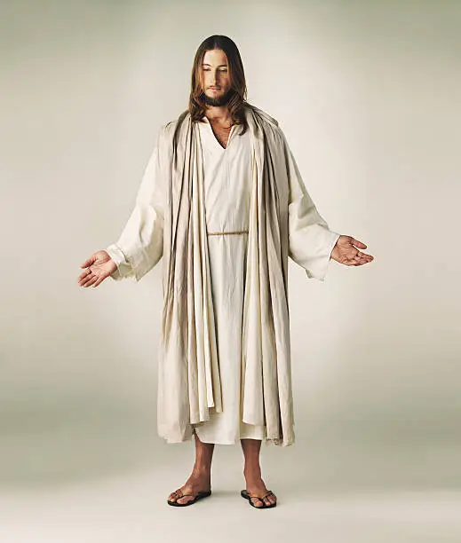 Studio shot of Jesus Christ extending his arms