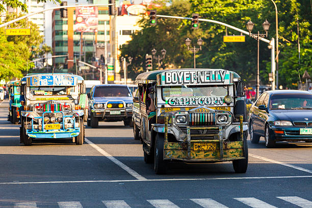 jeepneys in ermita - front view bus photography day stock-fotos und bilder