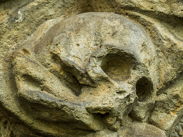 istock skull and bones ornaments on an old cemetery 586384450