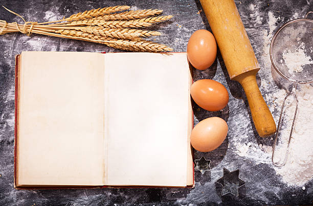 istock Old recipe book with ingredients for cooking 586385688