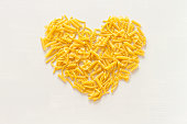 Top view heart of raw pasta
